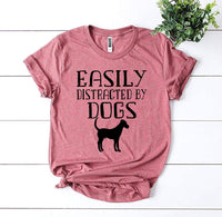 Thumbnail for Easily Distracted By Dogs T-shirtProduct description:
Make a statement with this Easily Distracted By Dogs T-shirt! It's made of premium quality ring spun cotton for a soft feel and comfortable fit.T-shirtsEXPRESS WOMEN'S FASHIONAgateEasily Distracted