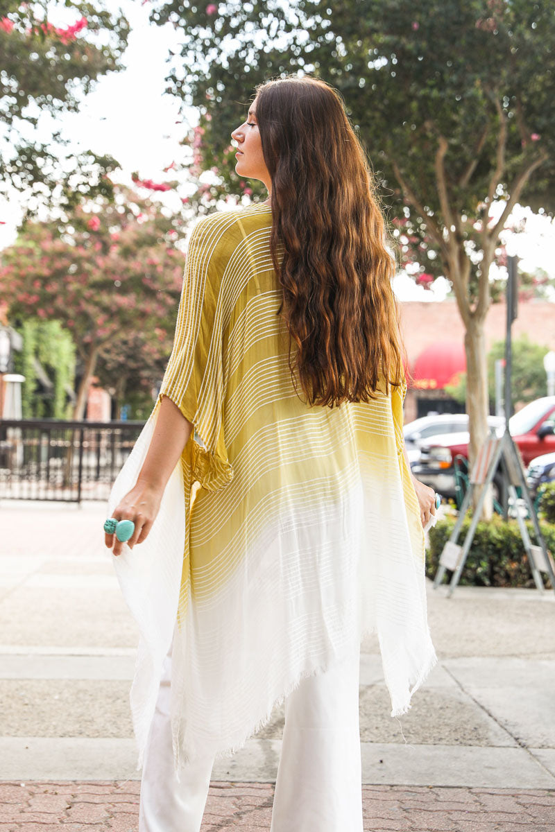 Stripe Woven Dip Dyed KimonoYou'll love this Stripe Woven Dip Dyed Kimono! This feathery and lightweight piece is made of 100% polyester and features a fun dip-dye pattern that's easy to style.AccessoriesEXPRESS WOMEN'S FASHIONPeriwinkle AetherStripe Woven Dip Dyed Kimono