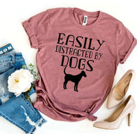 Thumbnail for Easily Distracted By Dogs T-shirtProduct description:
Make a statement with this Easily Distracted By Dogs T-shirt! It's made of premium quality ring spun cotton for a soft feel and comfortable fit.T-shirtsEXPRESS WOMEN'S FASHIONAgateEasily Distracted